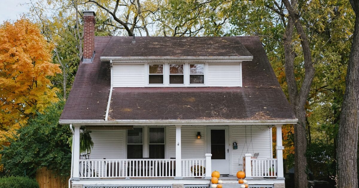Exterior of a residential house being repainted