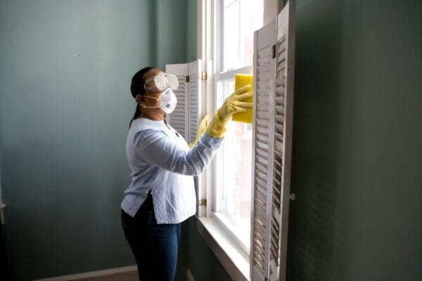 Paint roller applying color to a wall